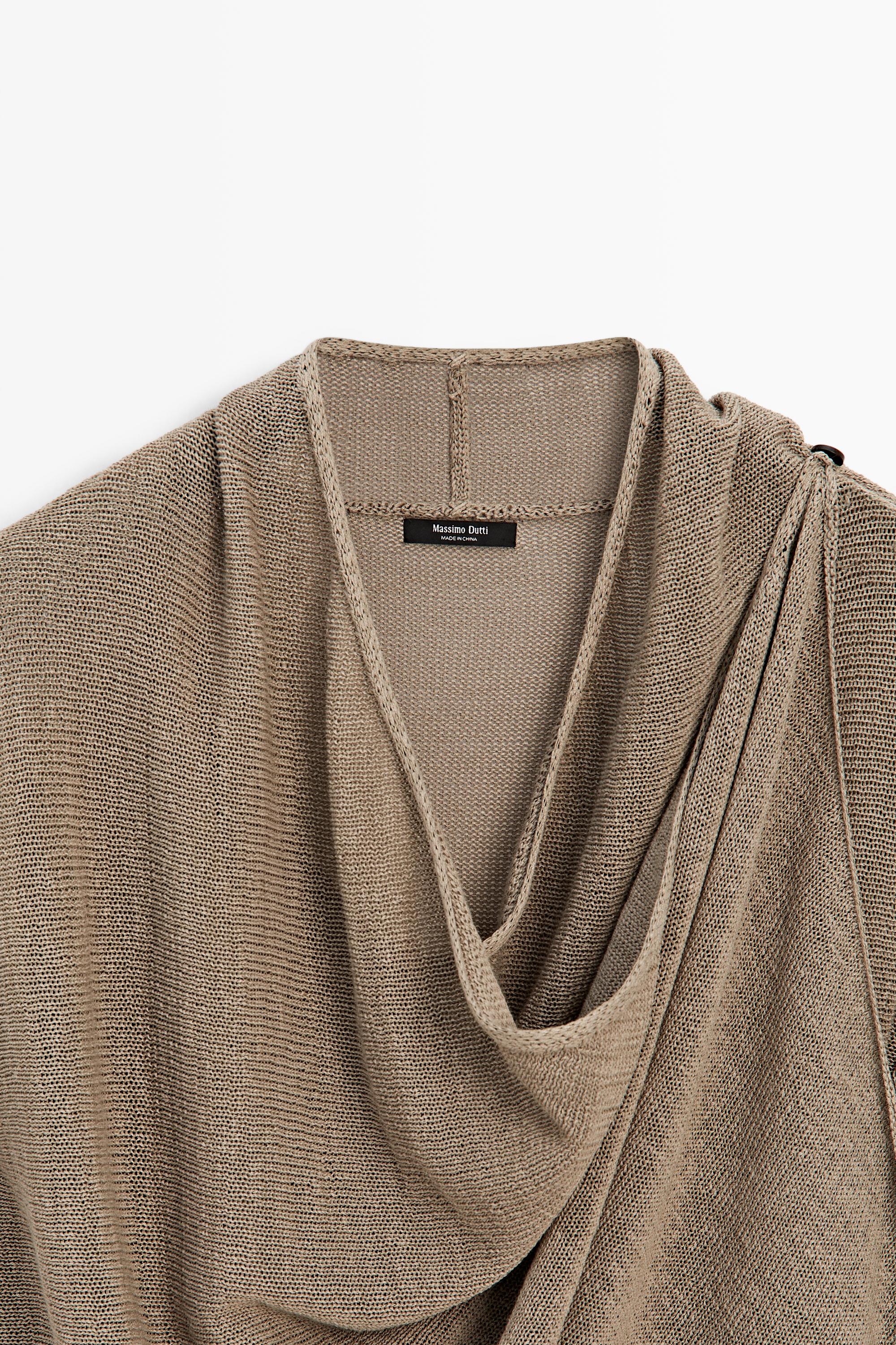 Cardigan cape en maille drapée