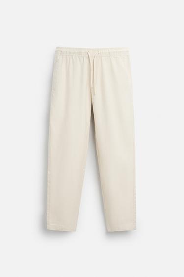 Zara TEXTURED RELAXED FIT PANTS - Light beige