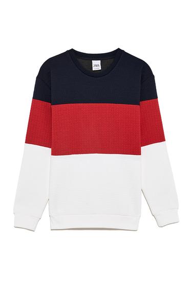 Quilted colorblock sweatshirt.