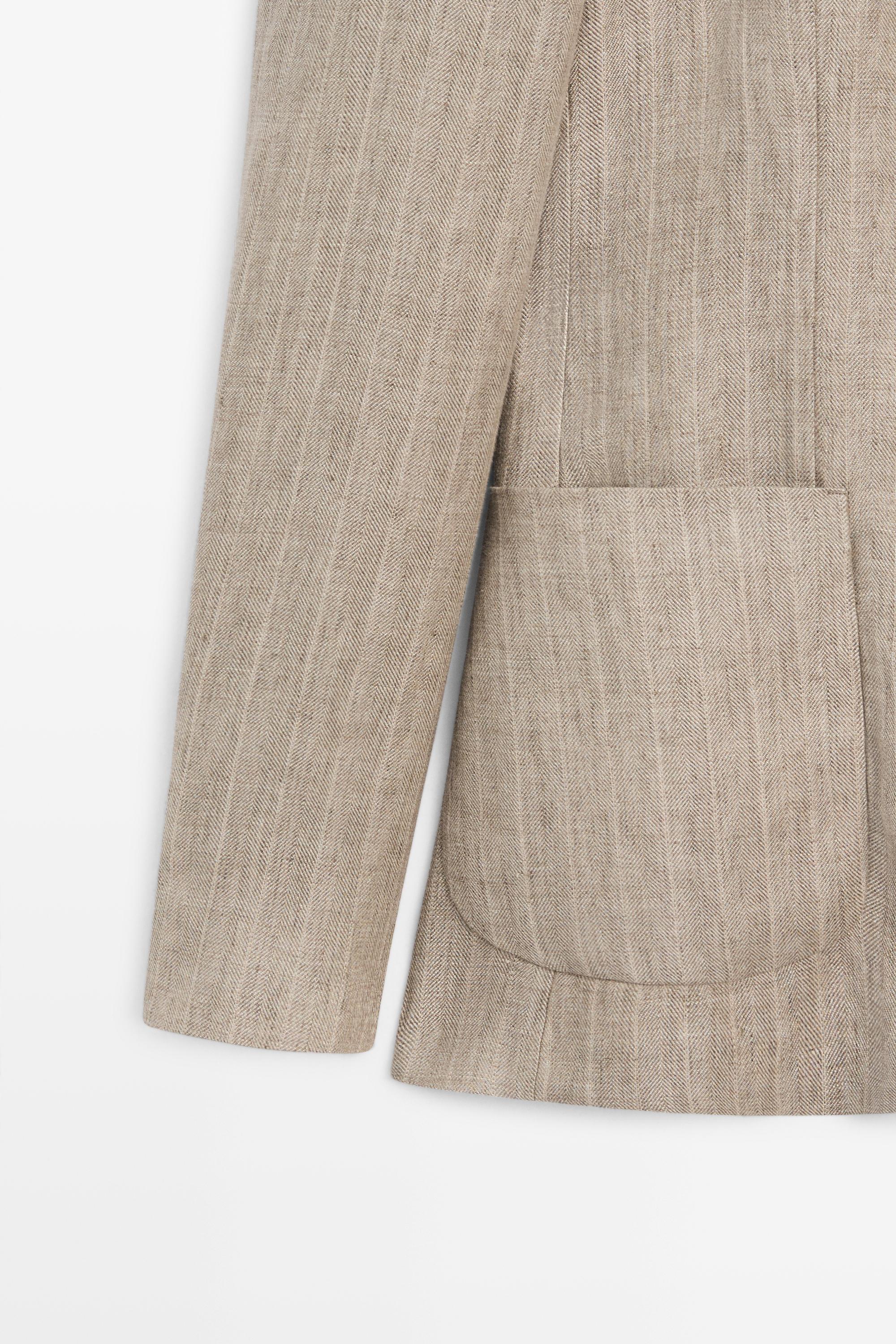 Blazer rayé à chevrons en lin