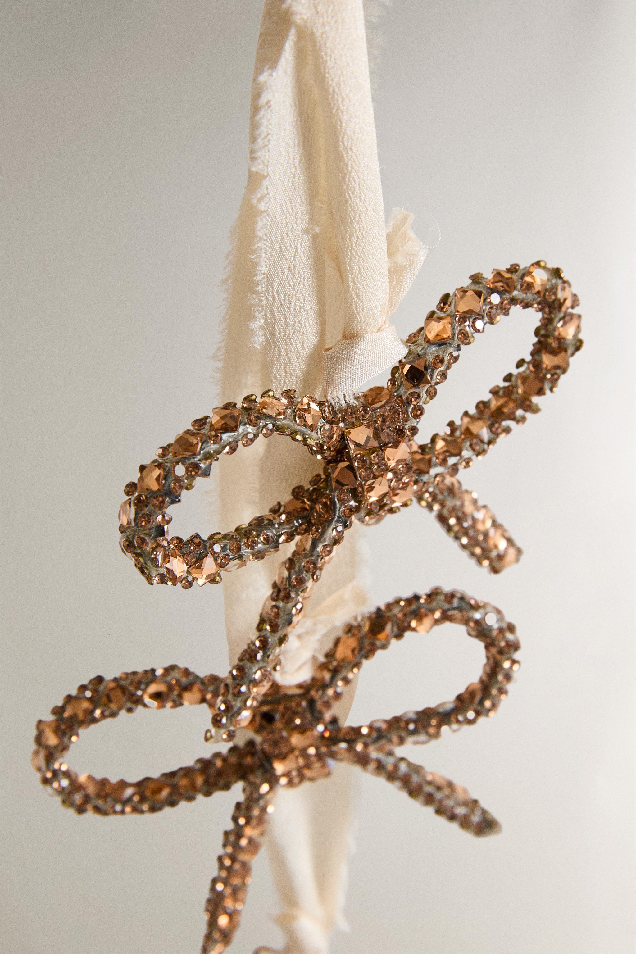 GLITTERY BOW CASCADE CHRISTMAS ORNAMENT