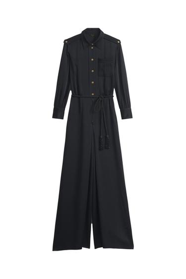 Front view of black dress with gold buttons, front pocket, and rope belt.