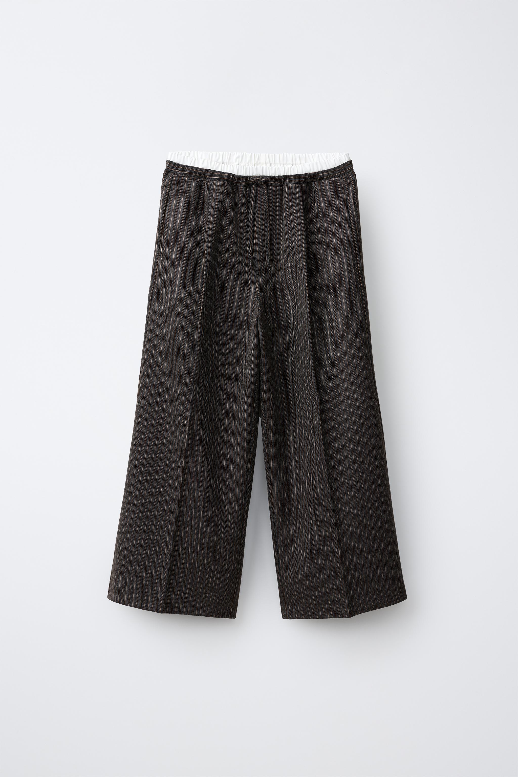 PANTALON À JAMBES LARGES RAYURES ET DOUBLE CEINTURE