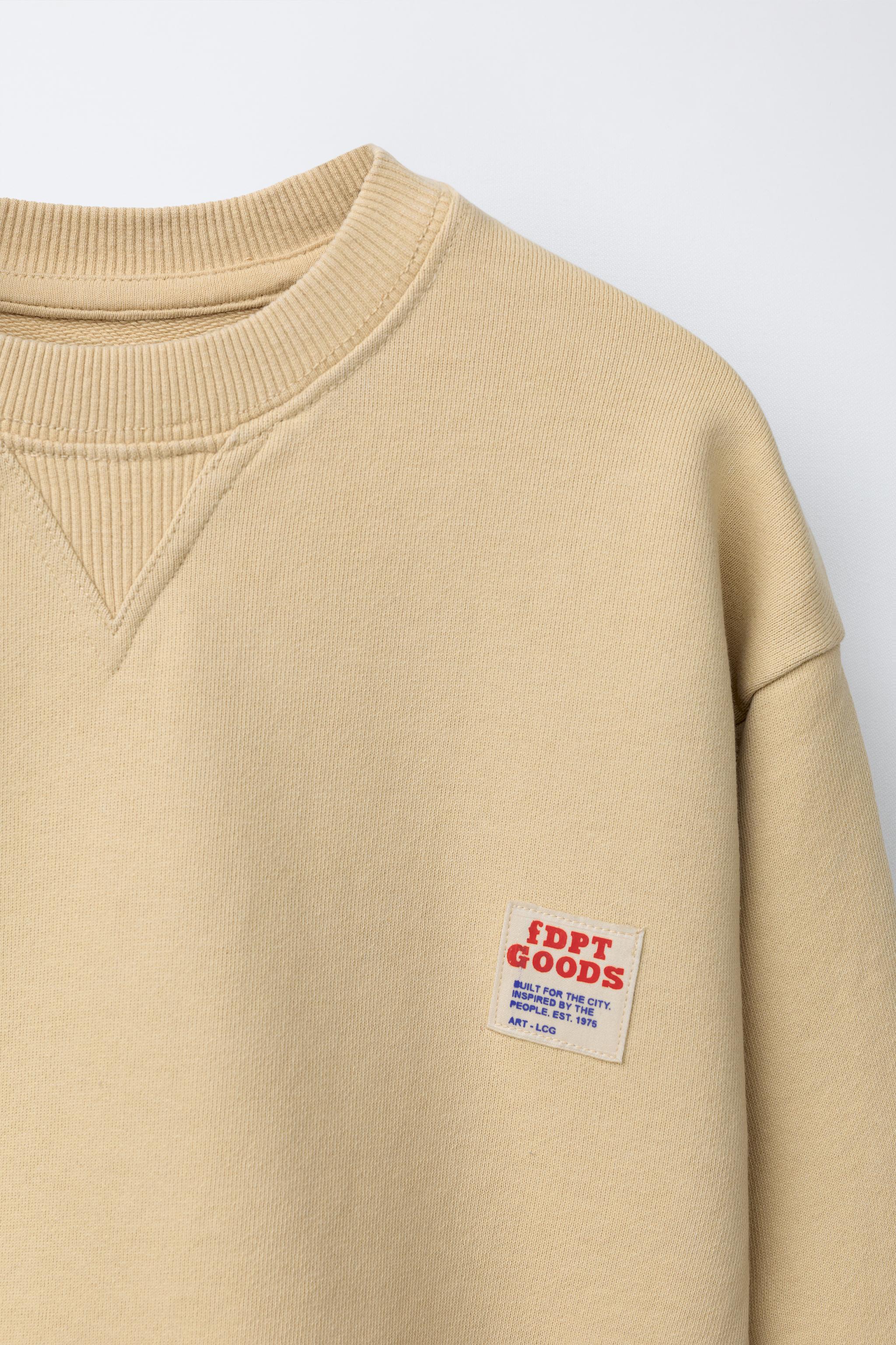 SWEAT TEINT EN PIÈCE ÉTIQUETTE