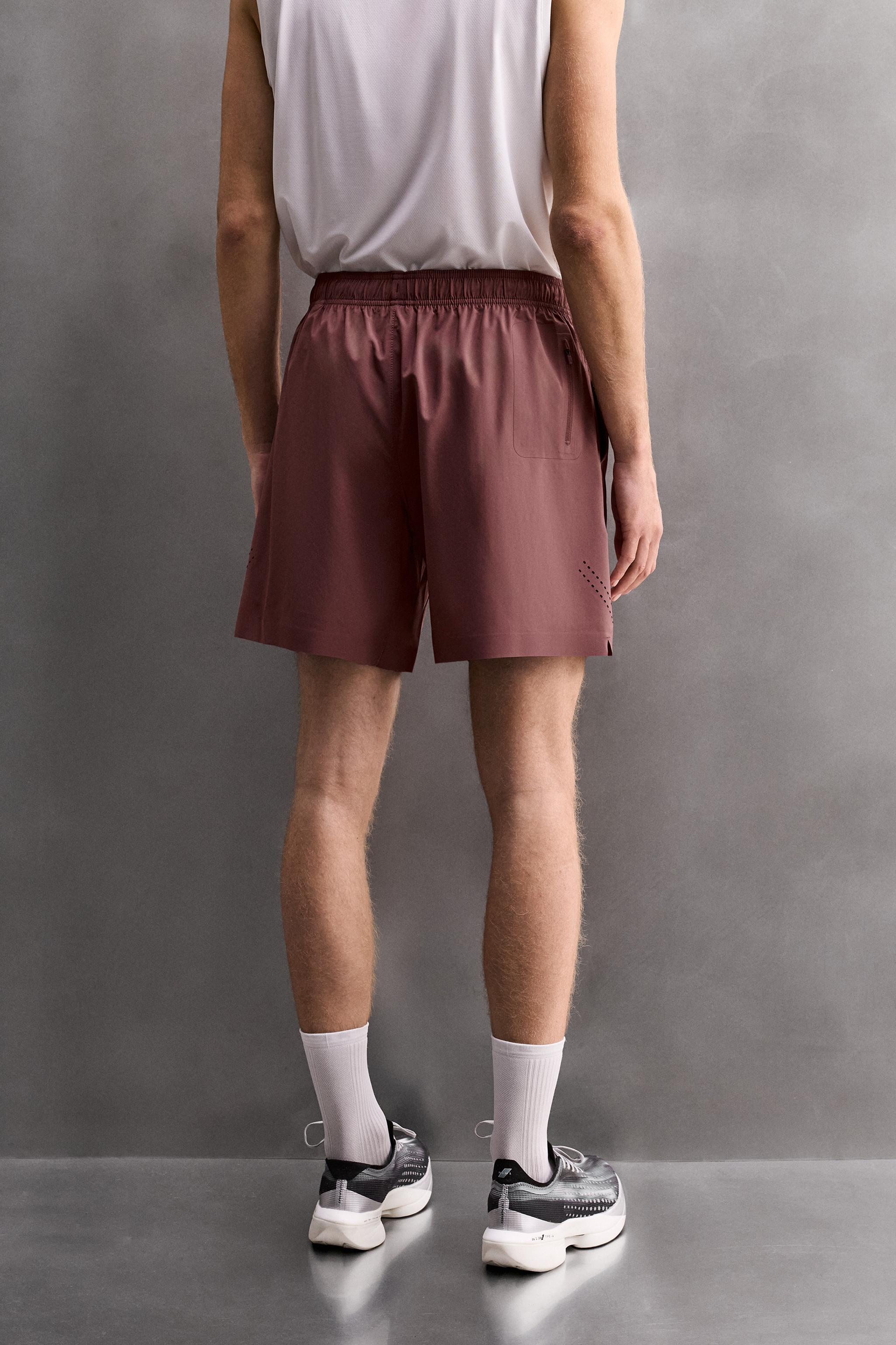9" PERFORATED SHORTS