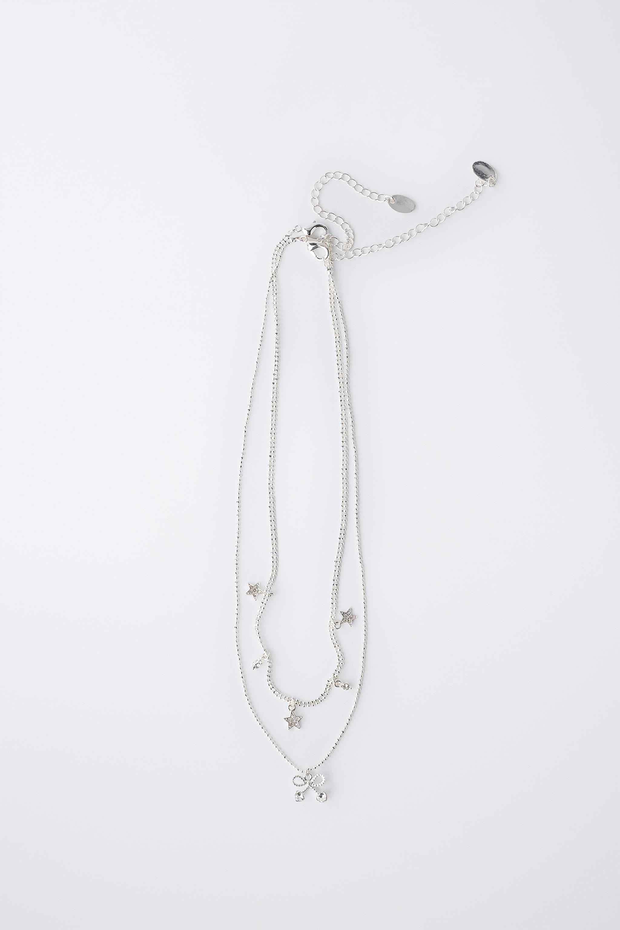 PACK OF TWO NECKLACES WITH STARS AND CHERRY PENDANT - Silver