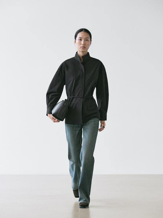 High neck shirt with strap detail