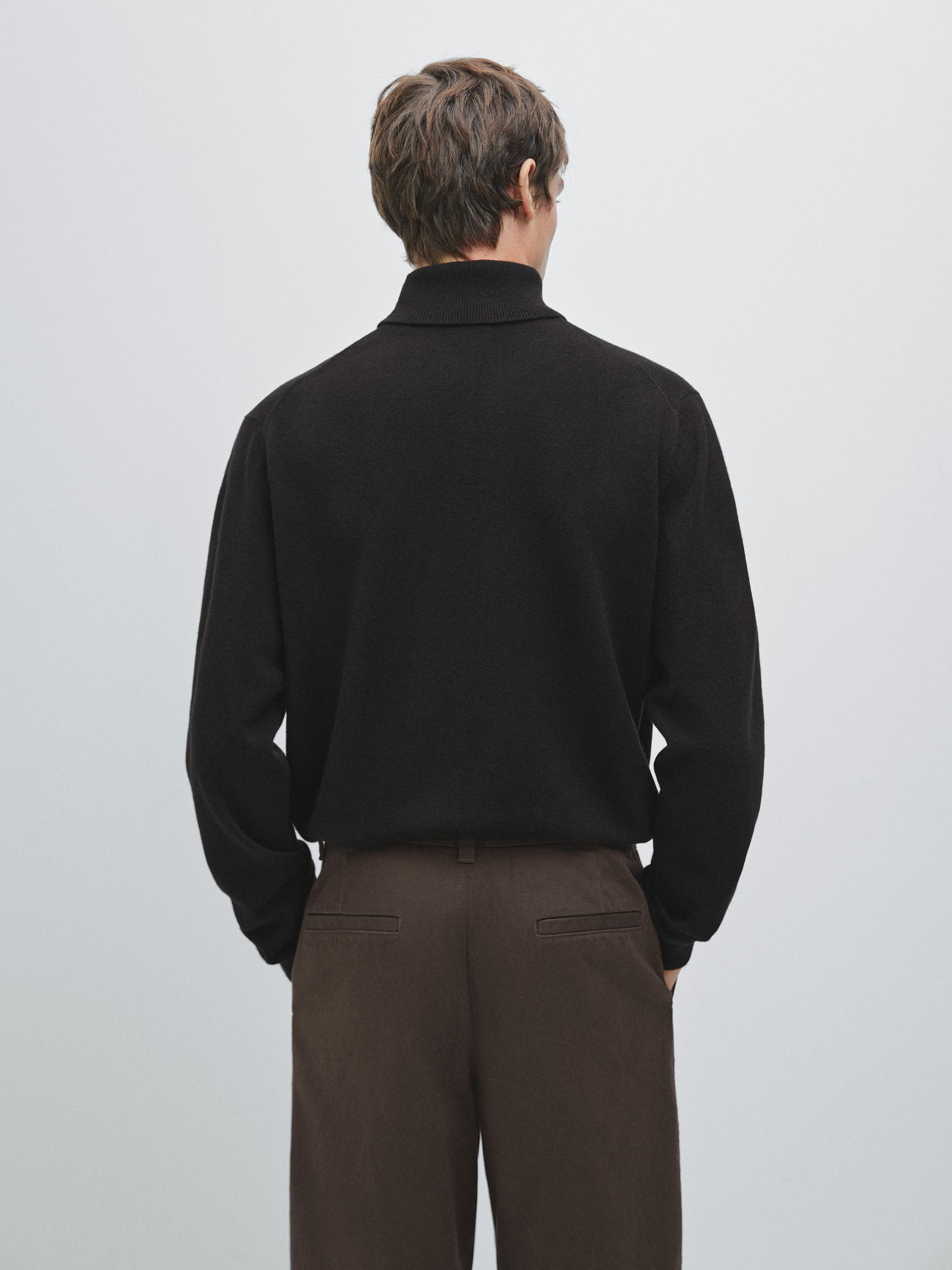 Wool blend knit sweater with high neck