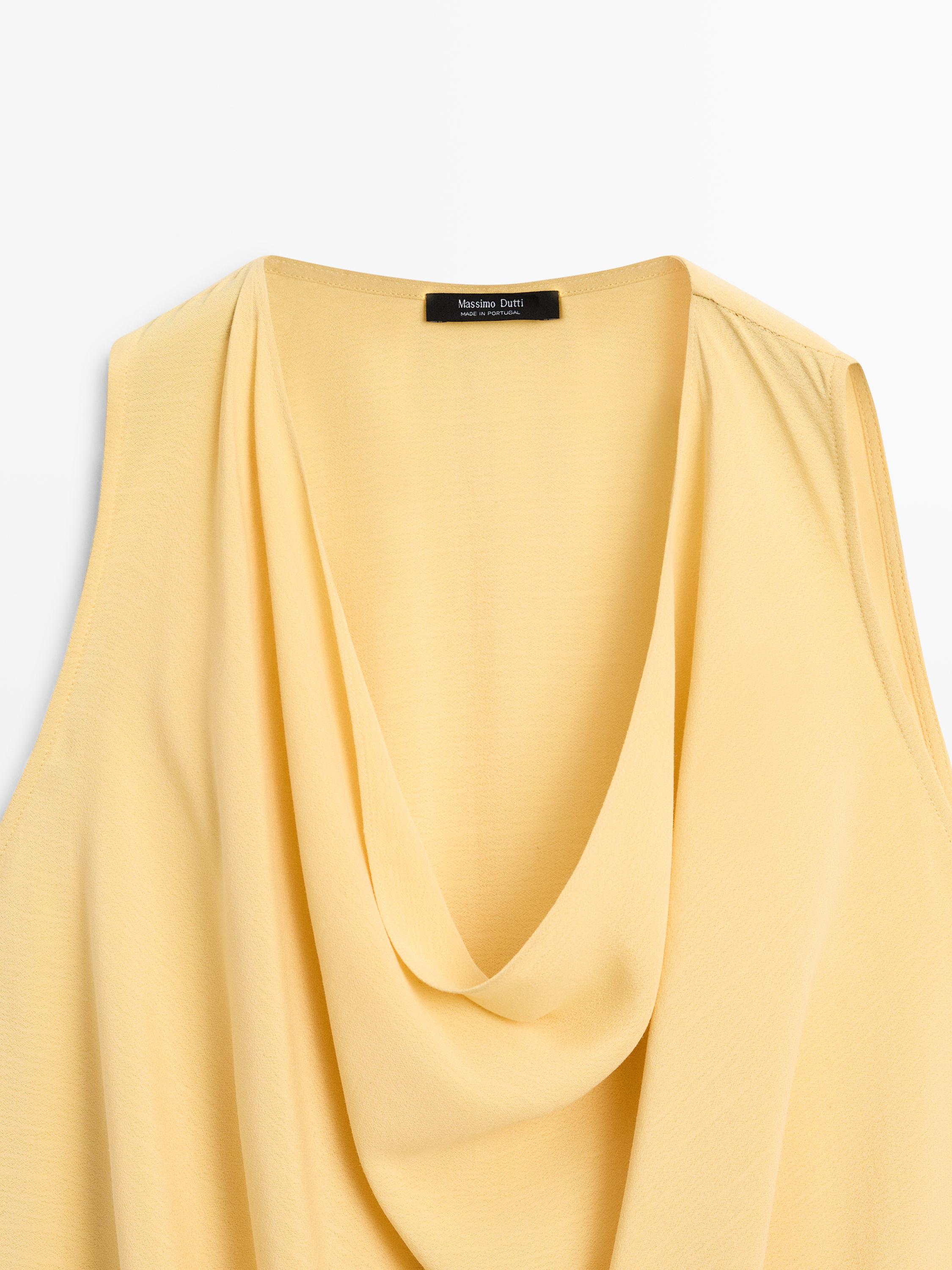 Long flowing asymmetric top