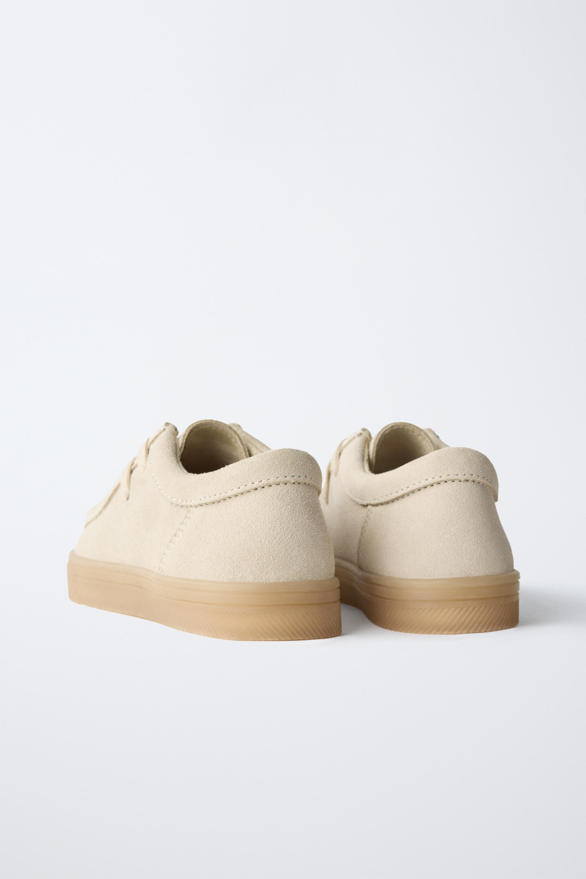 CHAUSSURES À BORD LARGE EN CUIR