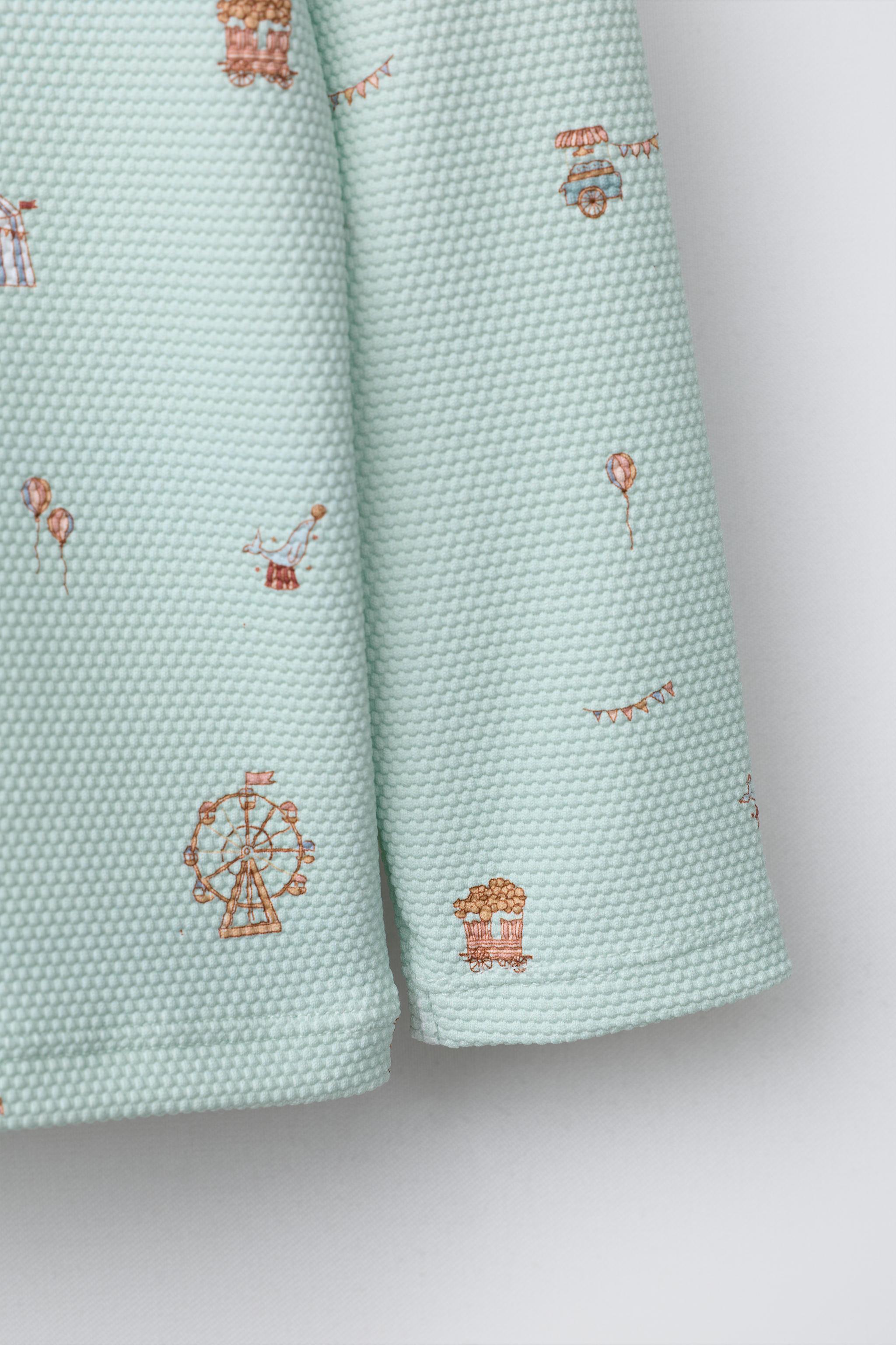 1-6 ANS/ T-SHIRT DE BAIN « CIRQUE »