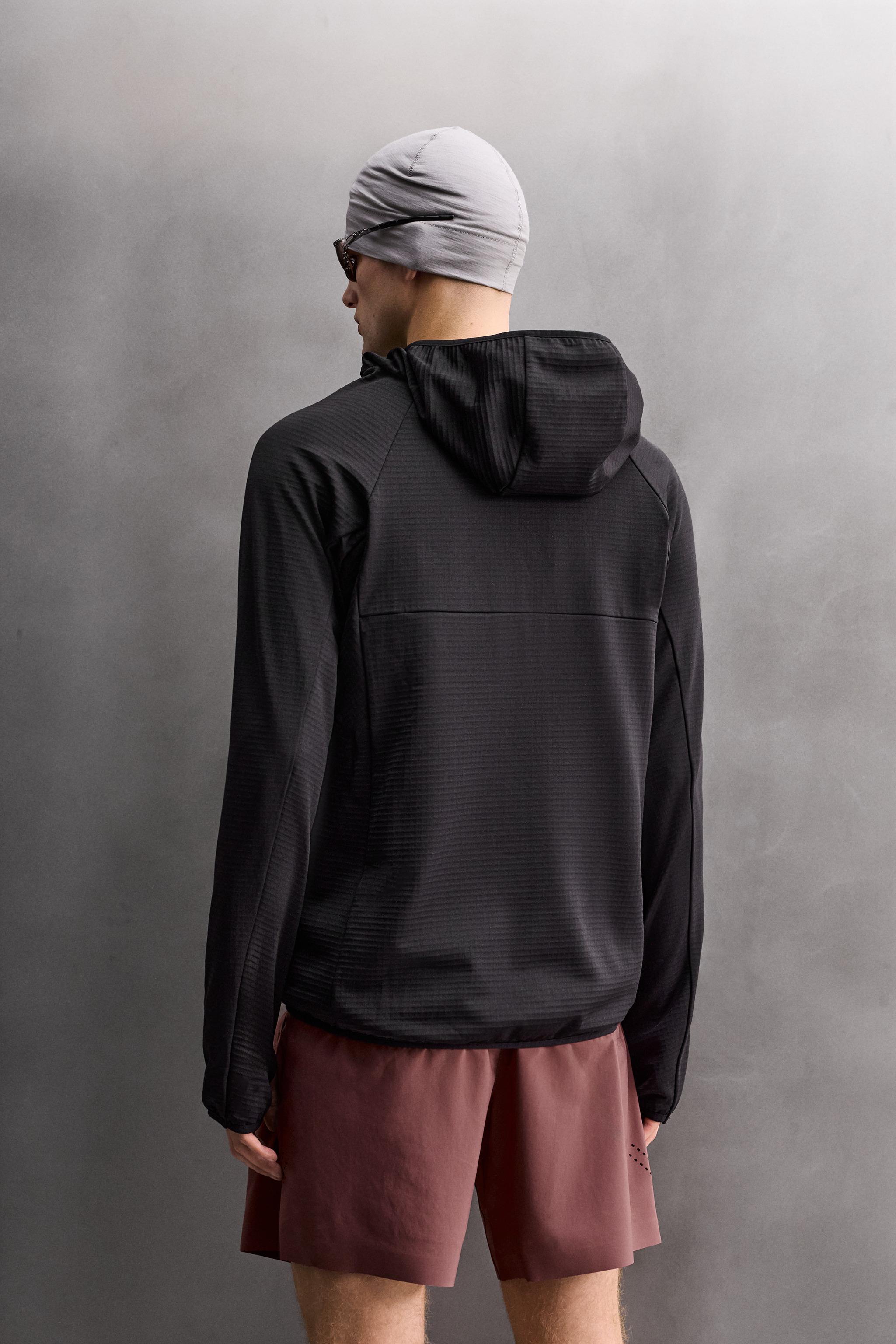 SWEAT TECHNIQUE À CAPUCHE BIMATIÈRE POLAIRE