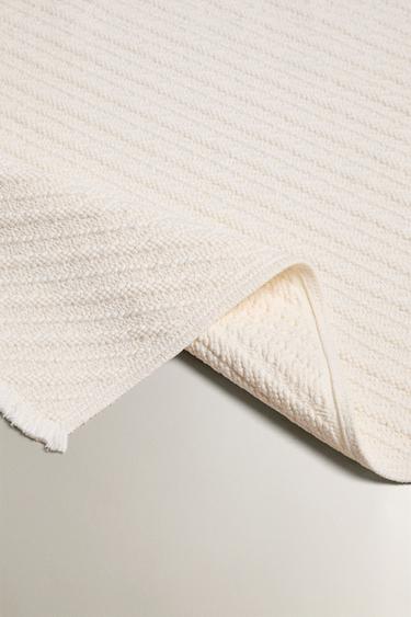 BATH MAT WITH DIAGONAL STRIPES - Ivory by Zara - Image 1