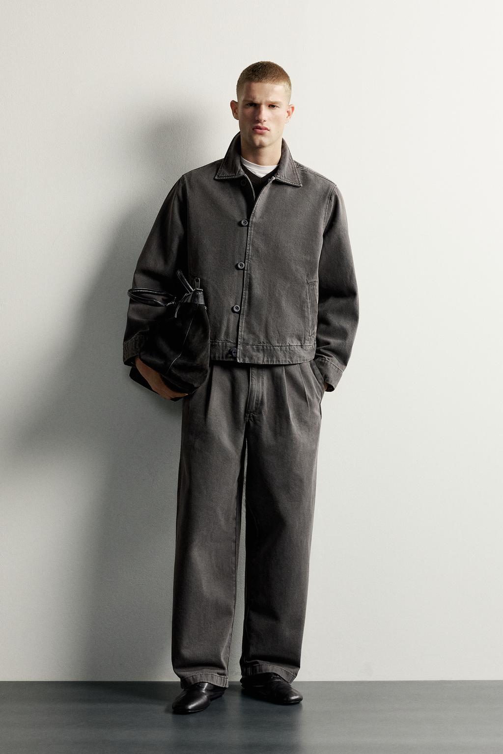 PLEATED RELAXED FIT CHINO TROUSERS