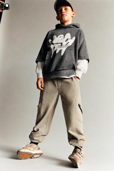 PANTALÓN JOGGER CREMALLERAS - Camel oscuro de Zara