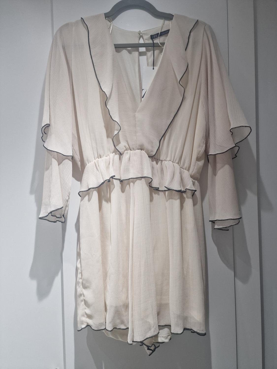 SHORT FRILLED JUMPSUIT