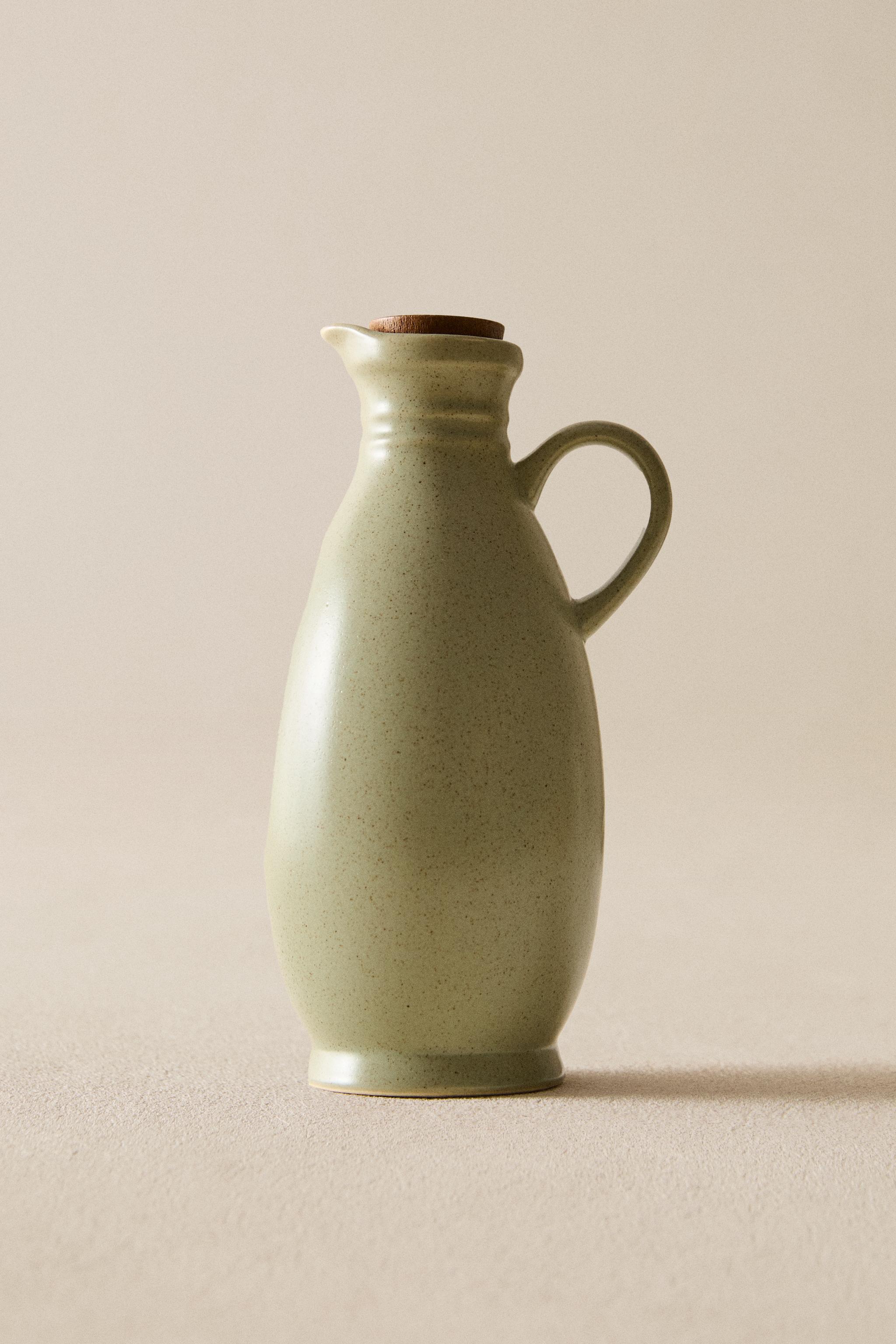 STONEWARE CRUET WITH LID