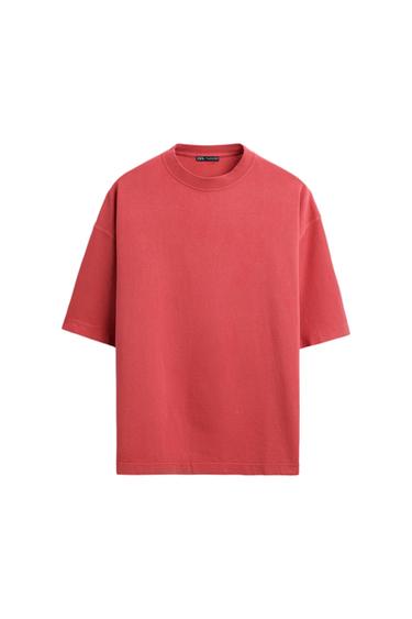 Red short-sleeved, crew-neck T-shirt on a white background. Visible 'ZARA' label on the collar.