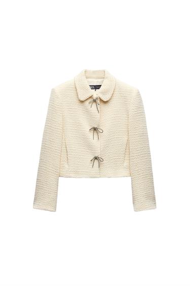 TEXTURED JACKET WITH BOW BUTTON