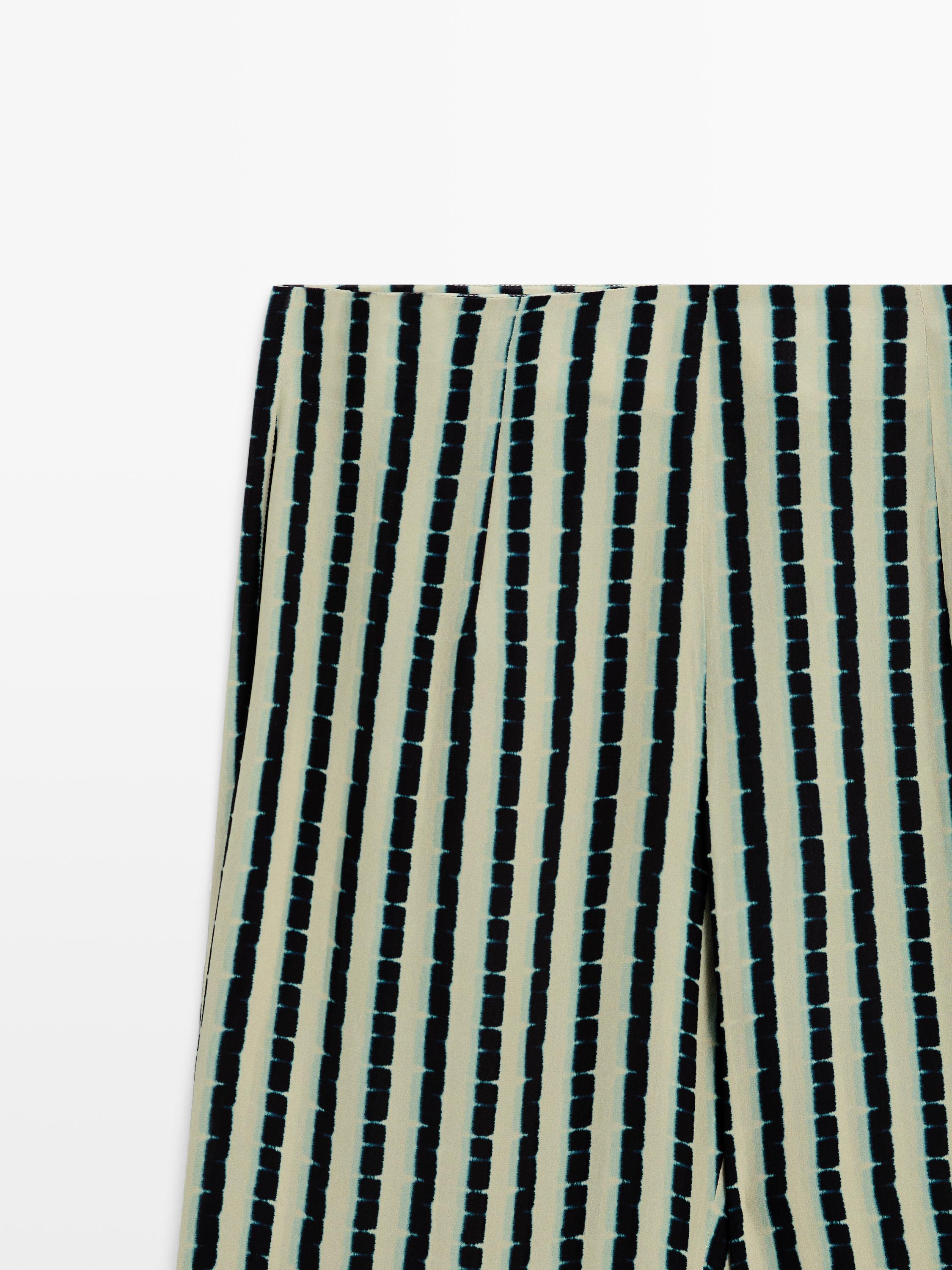 Striped flare fit trousers