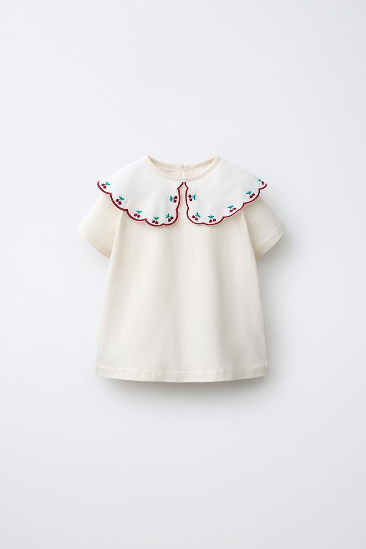 Camiseta cuello combinado bordado
