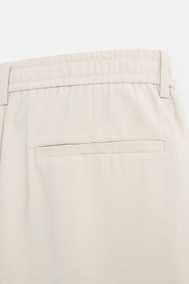 FLOWING PLEATED TROUSERS - Light beige by Zara - Image 9