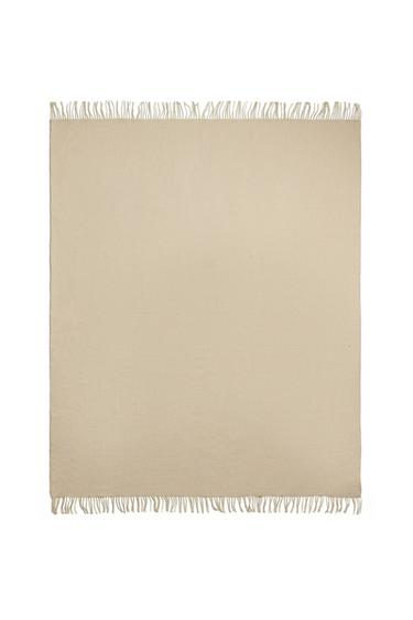 بطانية تزيينية بشُرّابات - خَام الخاص بـ Zara