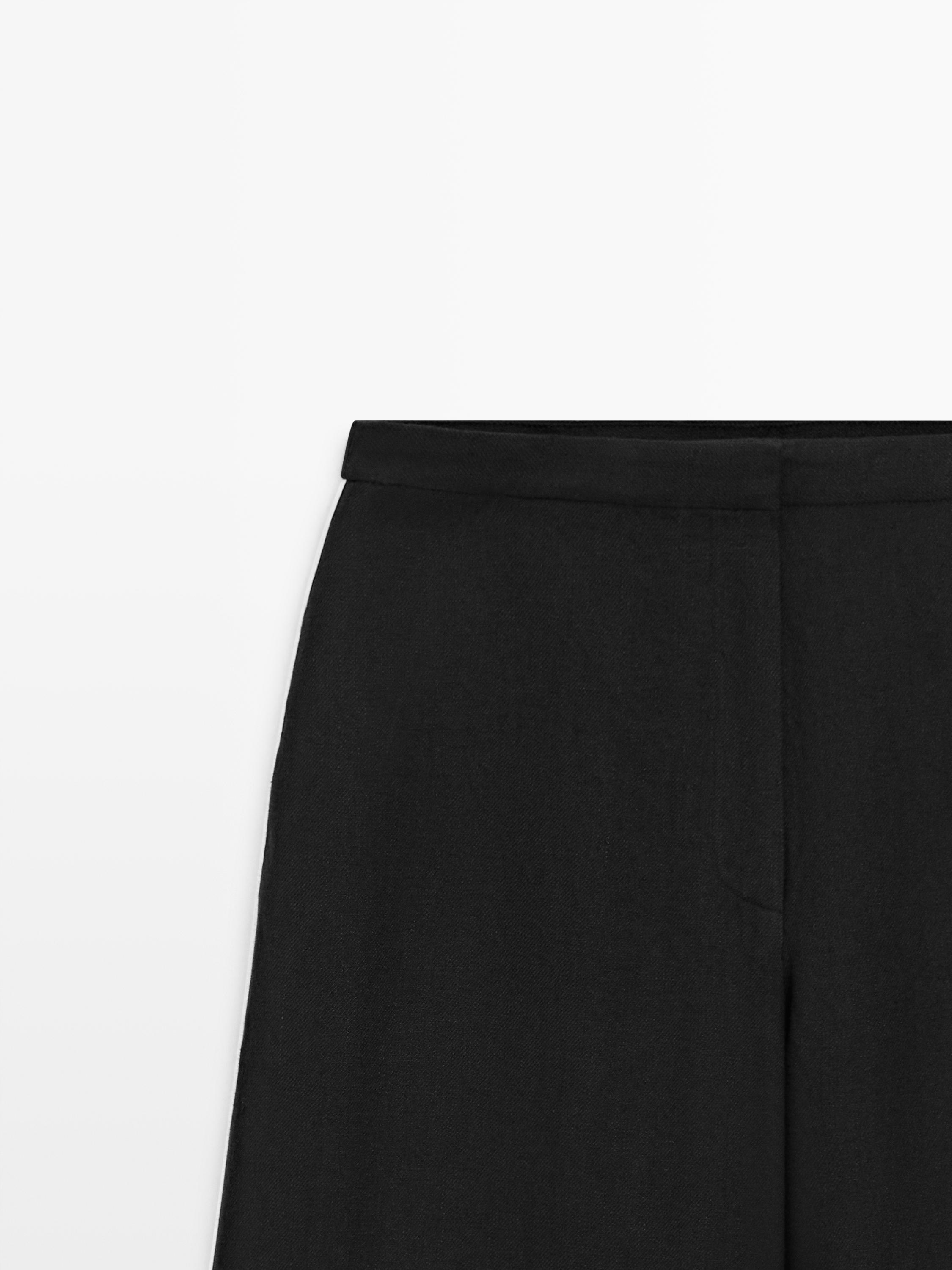 Pantalon en lin à ganse contrastée