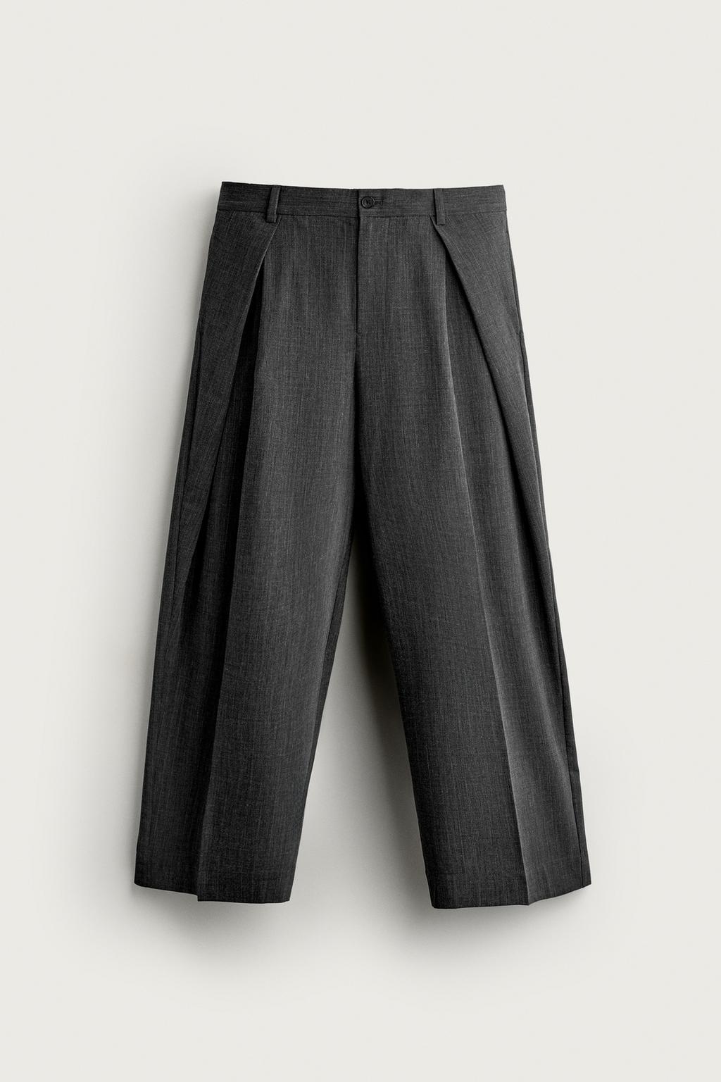 RELAXED FIT PLEATED TROUSERS