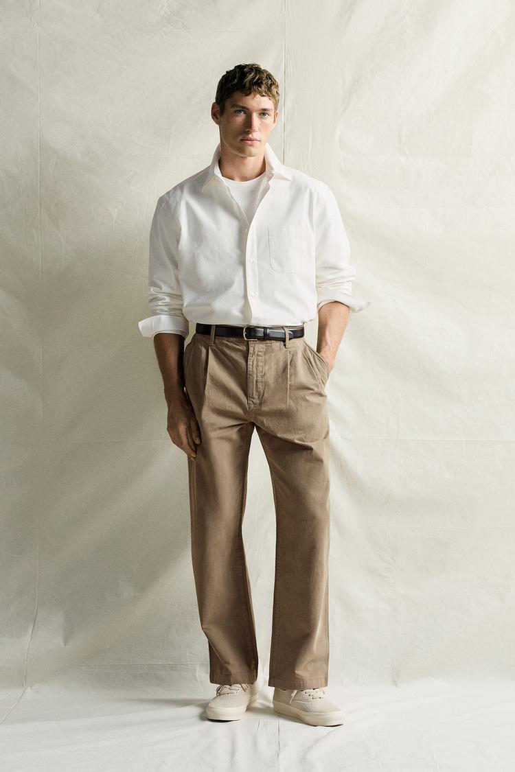REGULAR FIT PLEATED CHINO TROUSERS