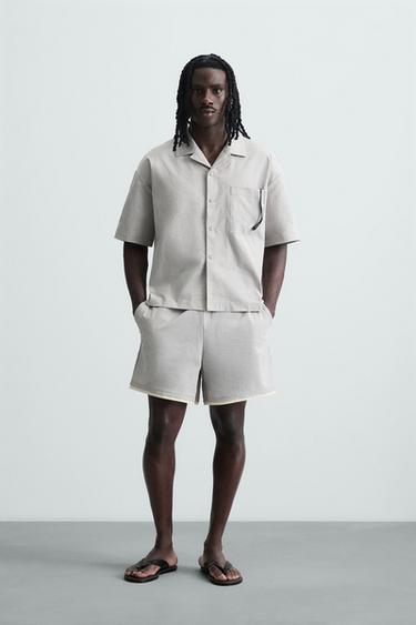 SHORTS TÉCNICOS CONTRASTE - Gris perla de Zara - Imagen 0