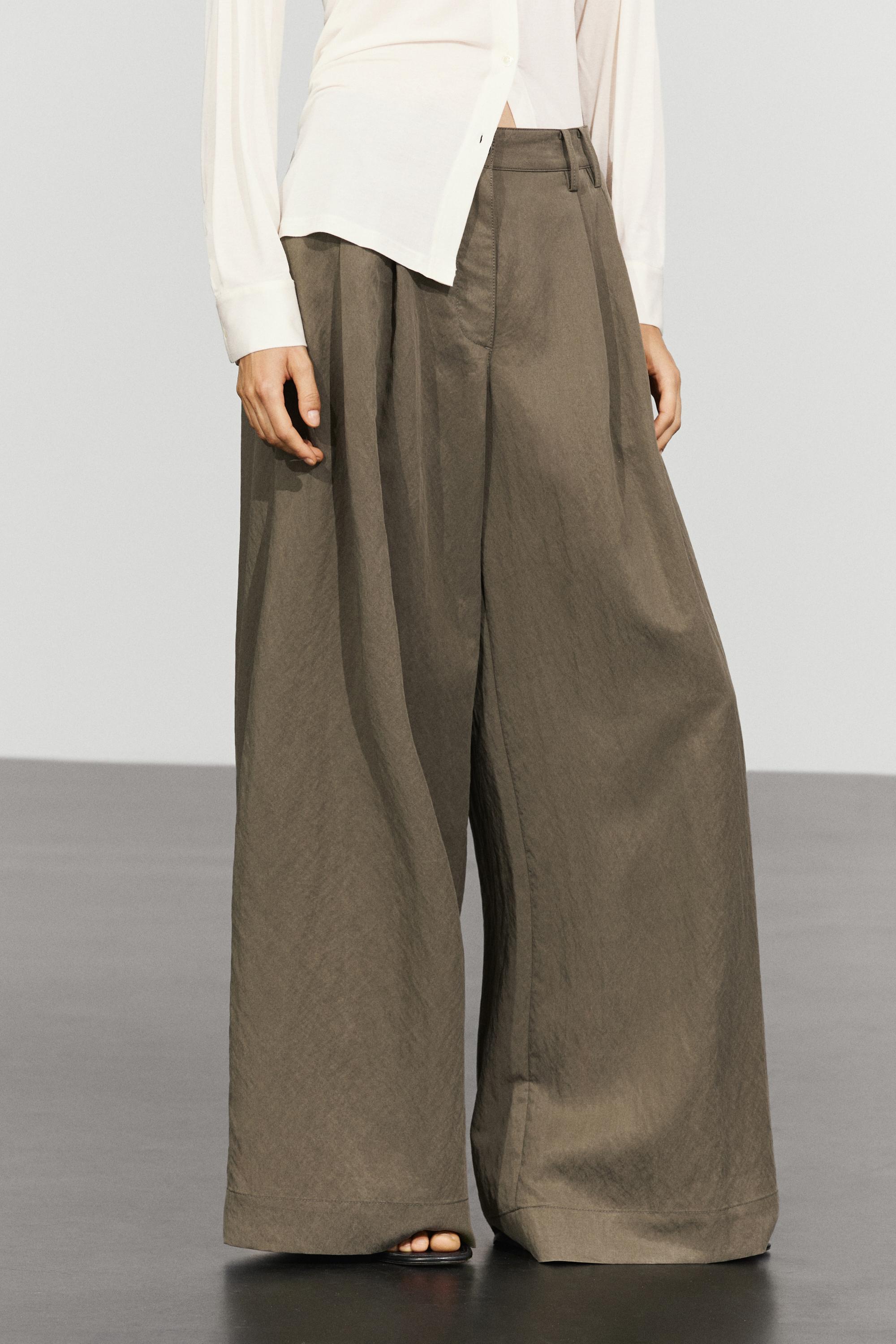 Technical wide-leg pleated pants