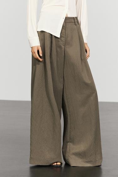 Technical wide-leg pleated pants — Black gold 2