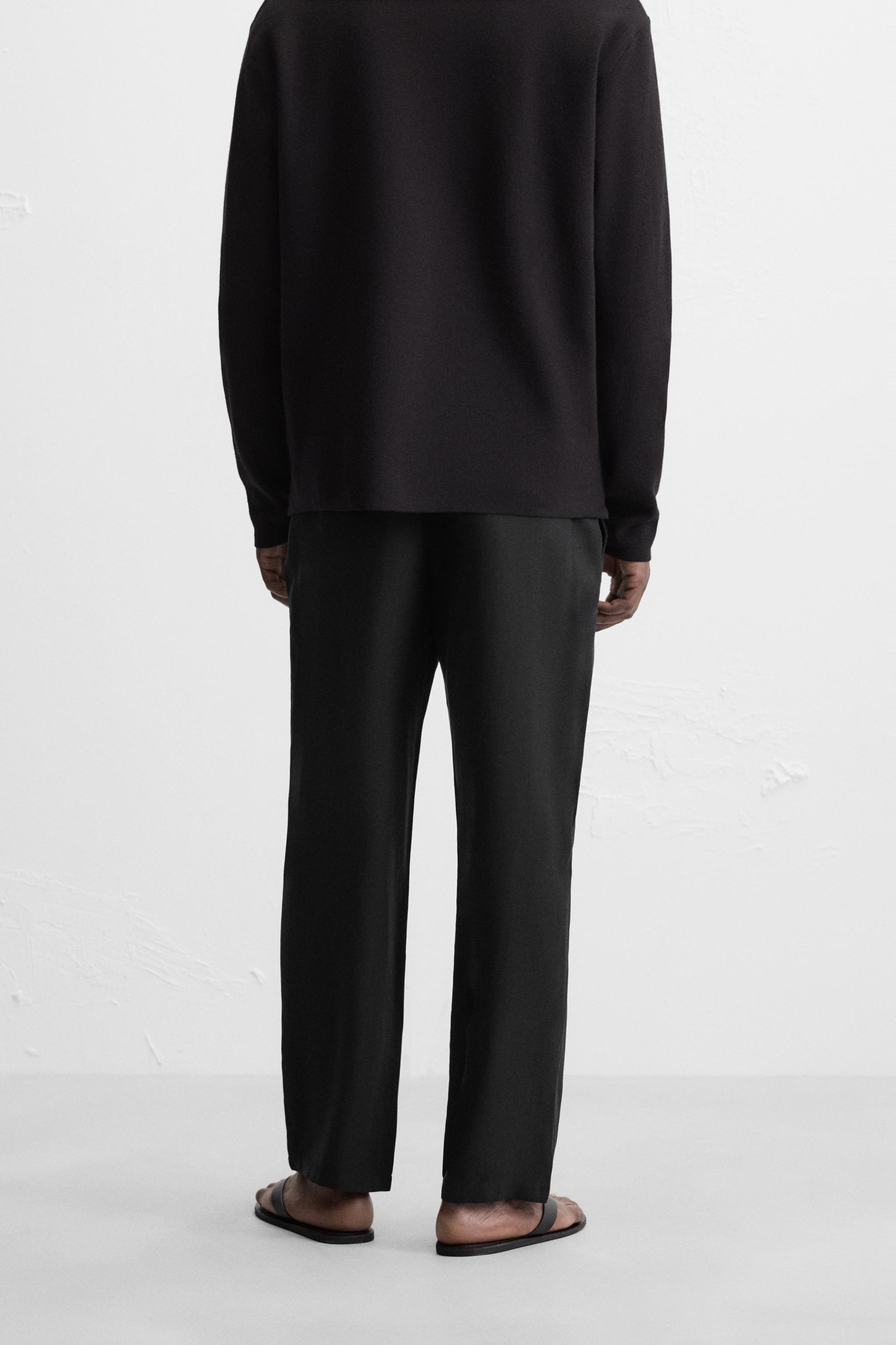 RELAXED FIT FLOWY PANTS