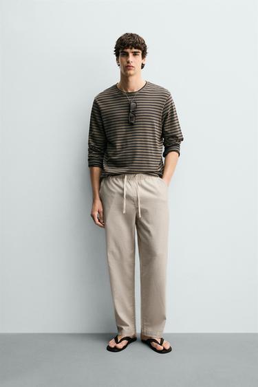 بنطلون RELAXED FIT هيكلي - بيج فاتح الخاص بـ Zara - صورة 0