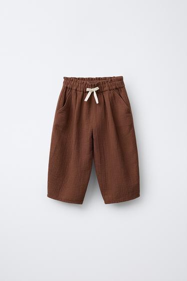 PANTALÓN BAGGY PESPUNTES - Cobre de Zara - Imagen 0