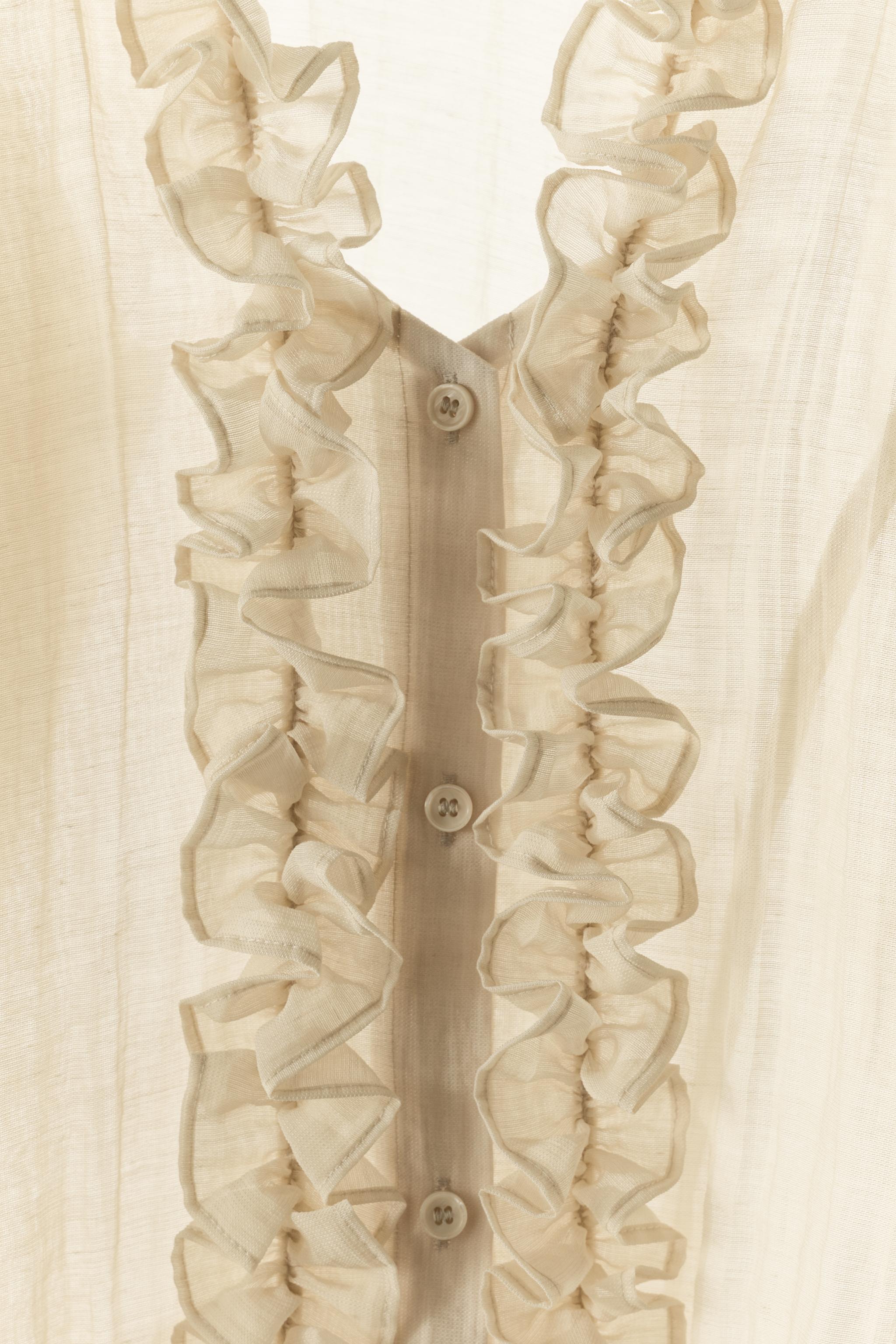 BLOUSE À VOLANTS