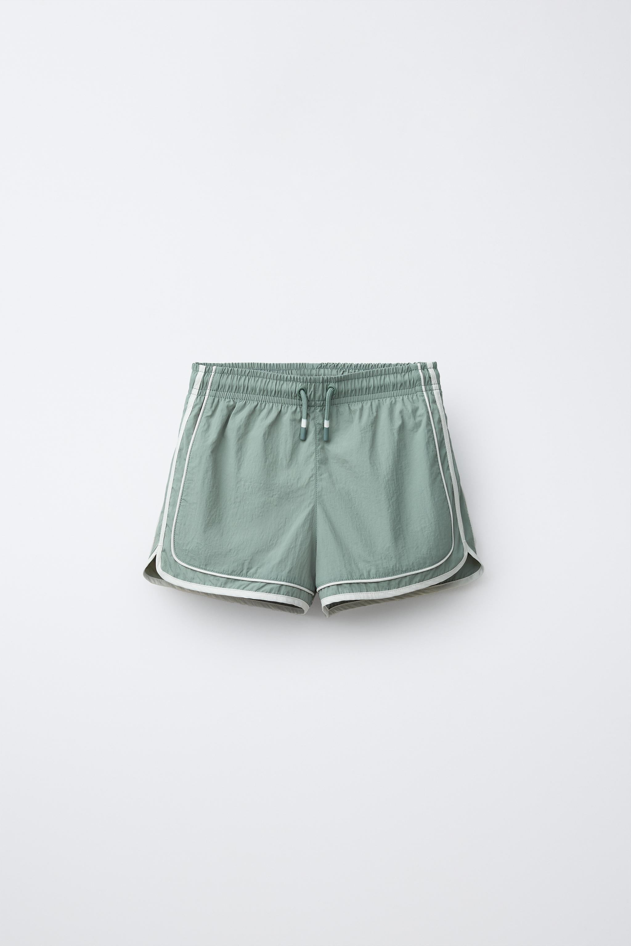 6-14 YEARS/ SWIM SHORTS WITH CONTRAST BANDS