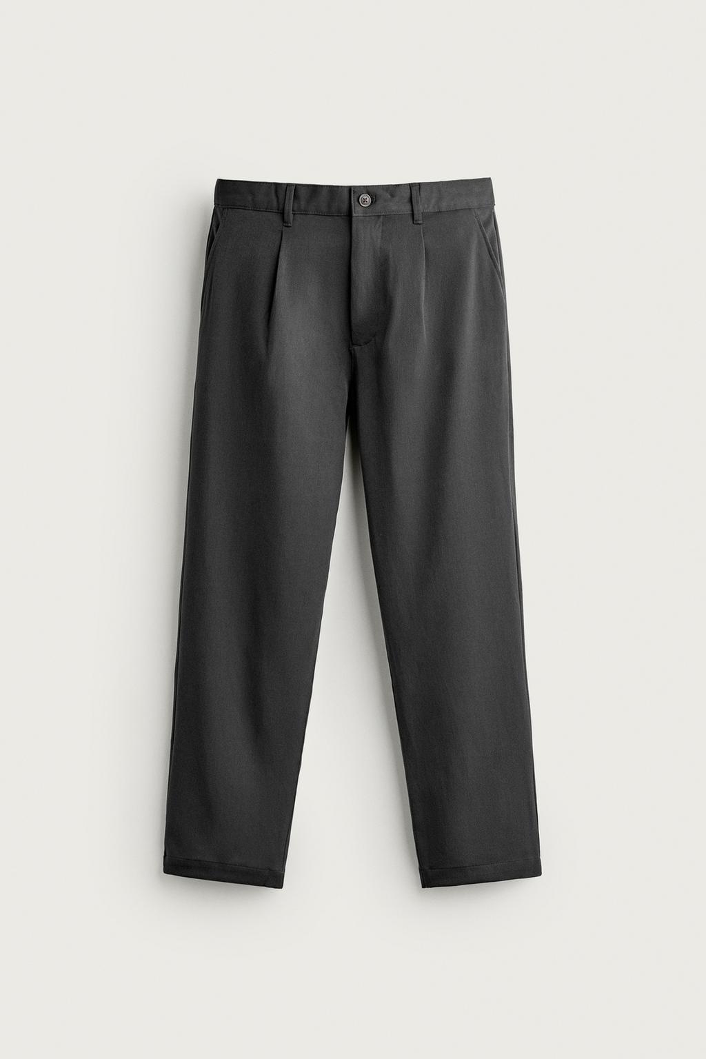 RELAXED FIT PLEATED TROUSERS