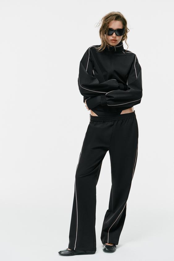 PANTALÓN TÉCNICO VIVO CONTRASTE - Negro de Zara - Imagen 0
