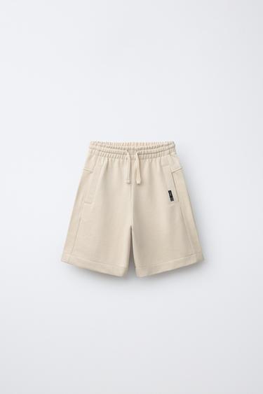 ПЛЮШЕВІ ШОРТИ З ЕТИКЕТКОЮ - Світло-бежевий колір Zara