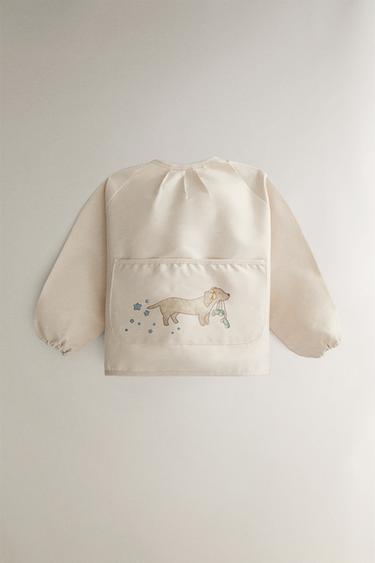 CHILDREN'S SKATER DOG BIB WITH SLEEVES - Light beige by Zara