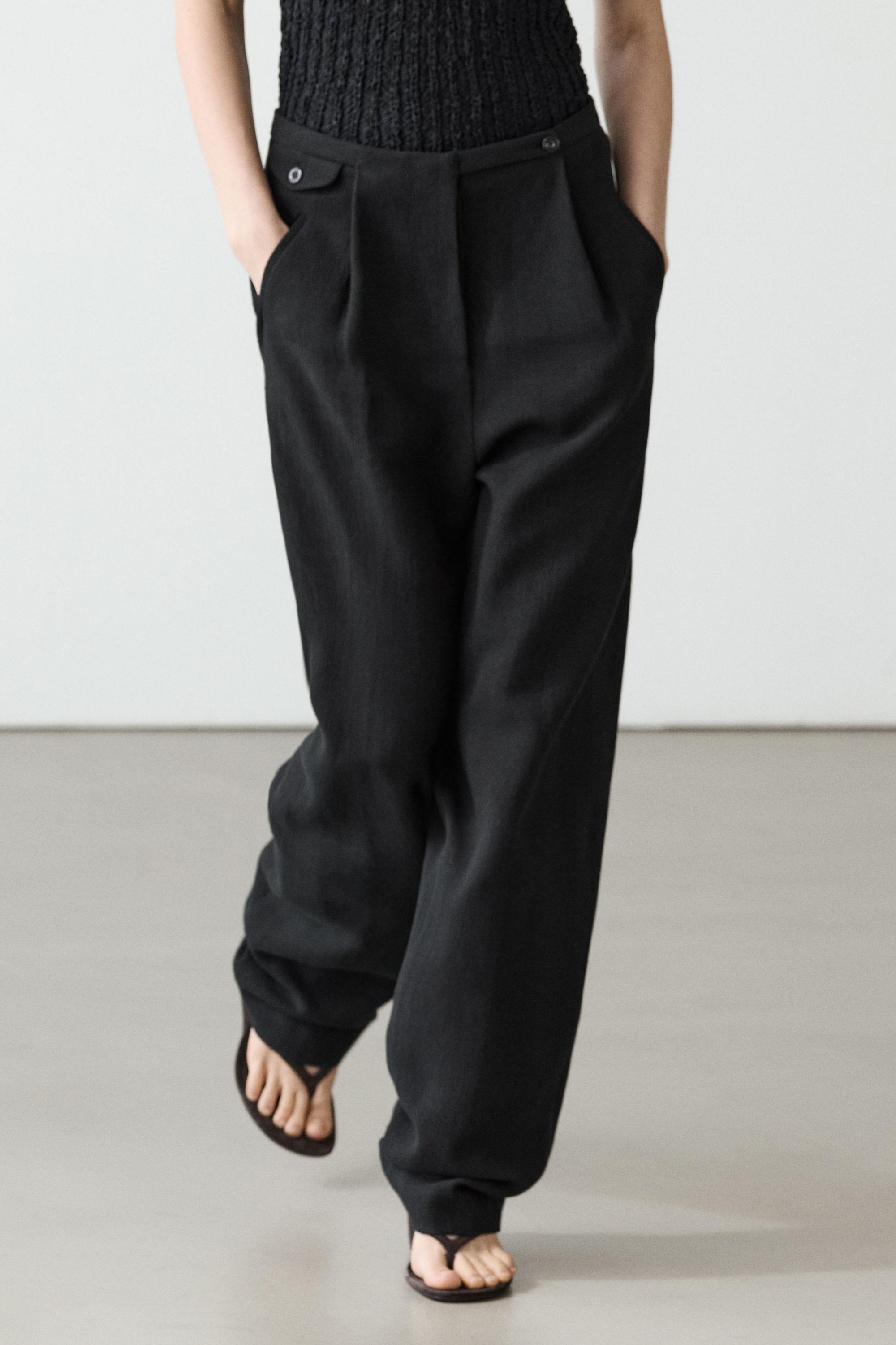 Flowing linen blend trousers with pocket details