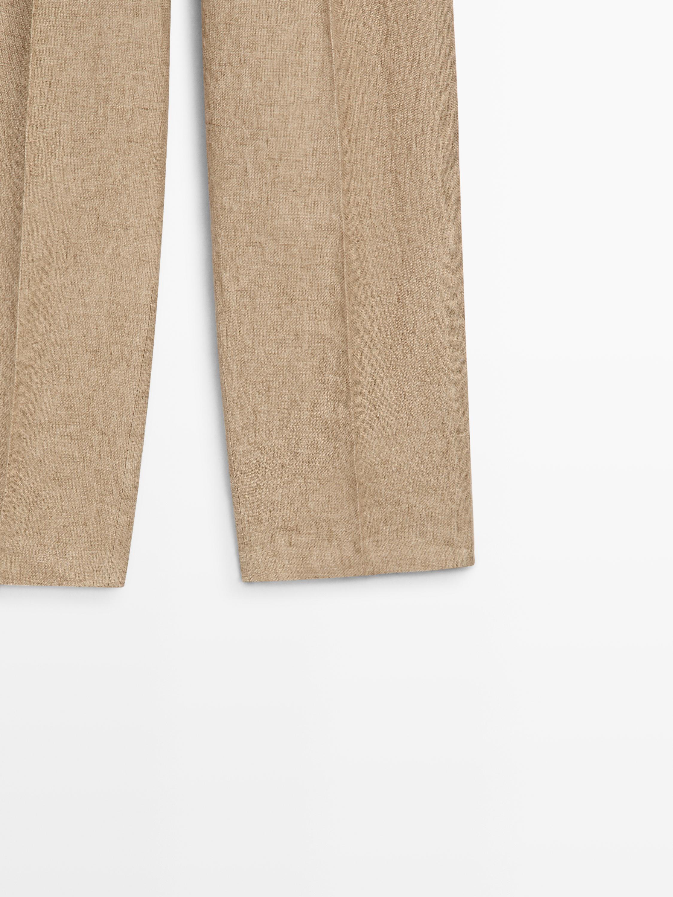 Flowing linen trousers with darts
