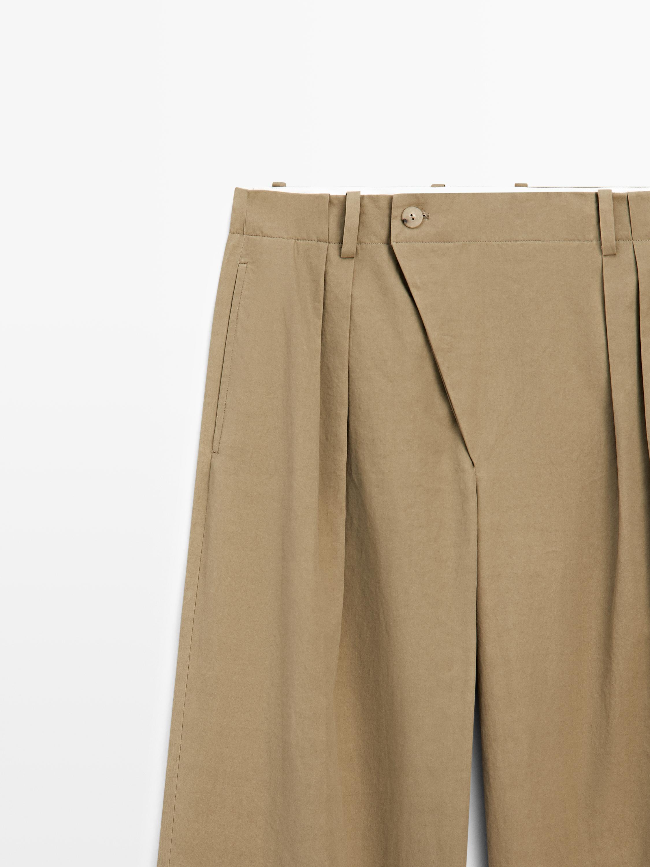 Pantalon à plis avec fermeture croisée - STUDIO