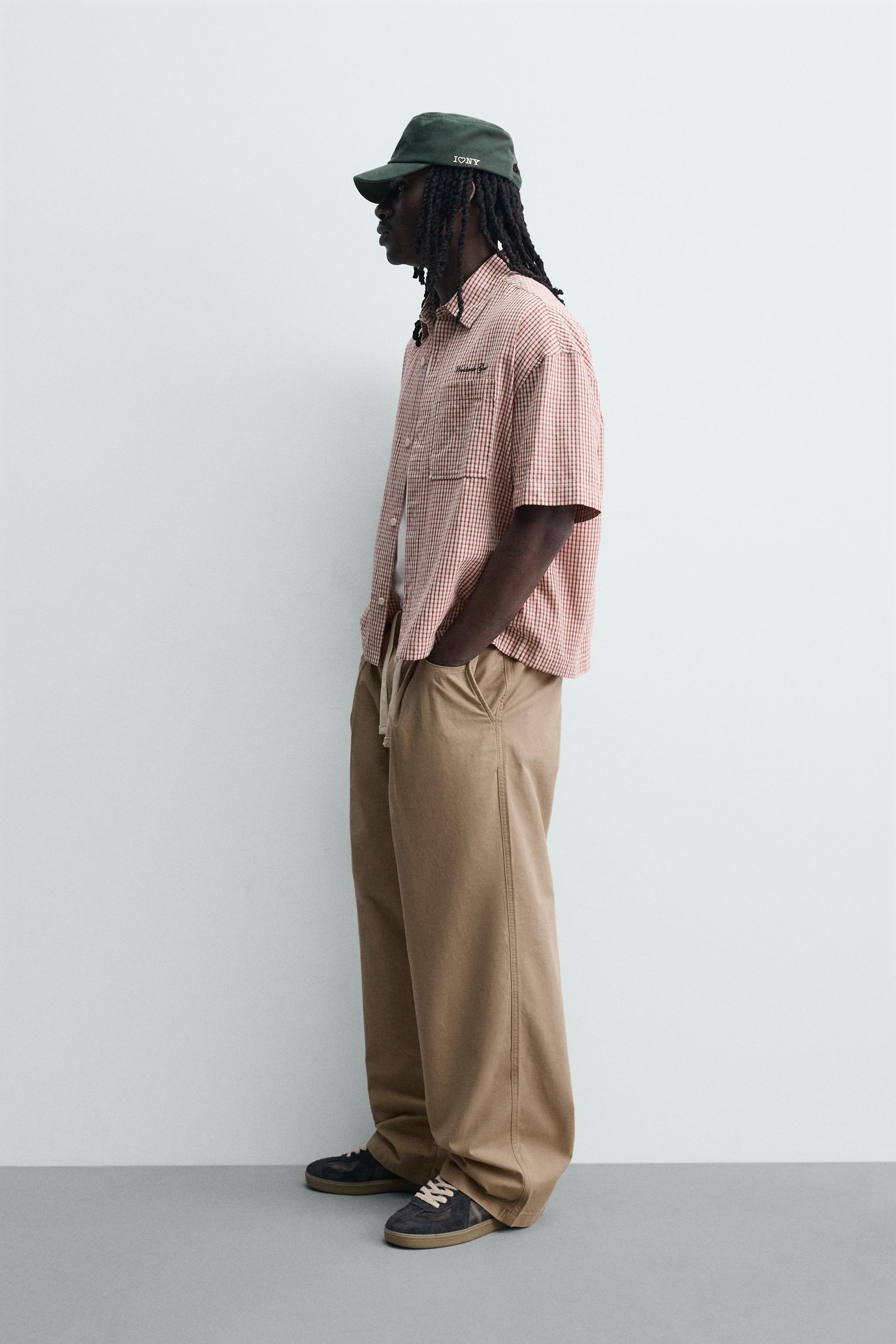 PANTALON CHINO LARGE À PLIS
