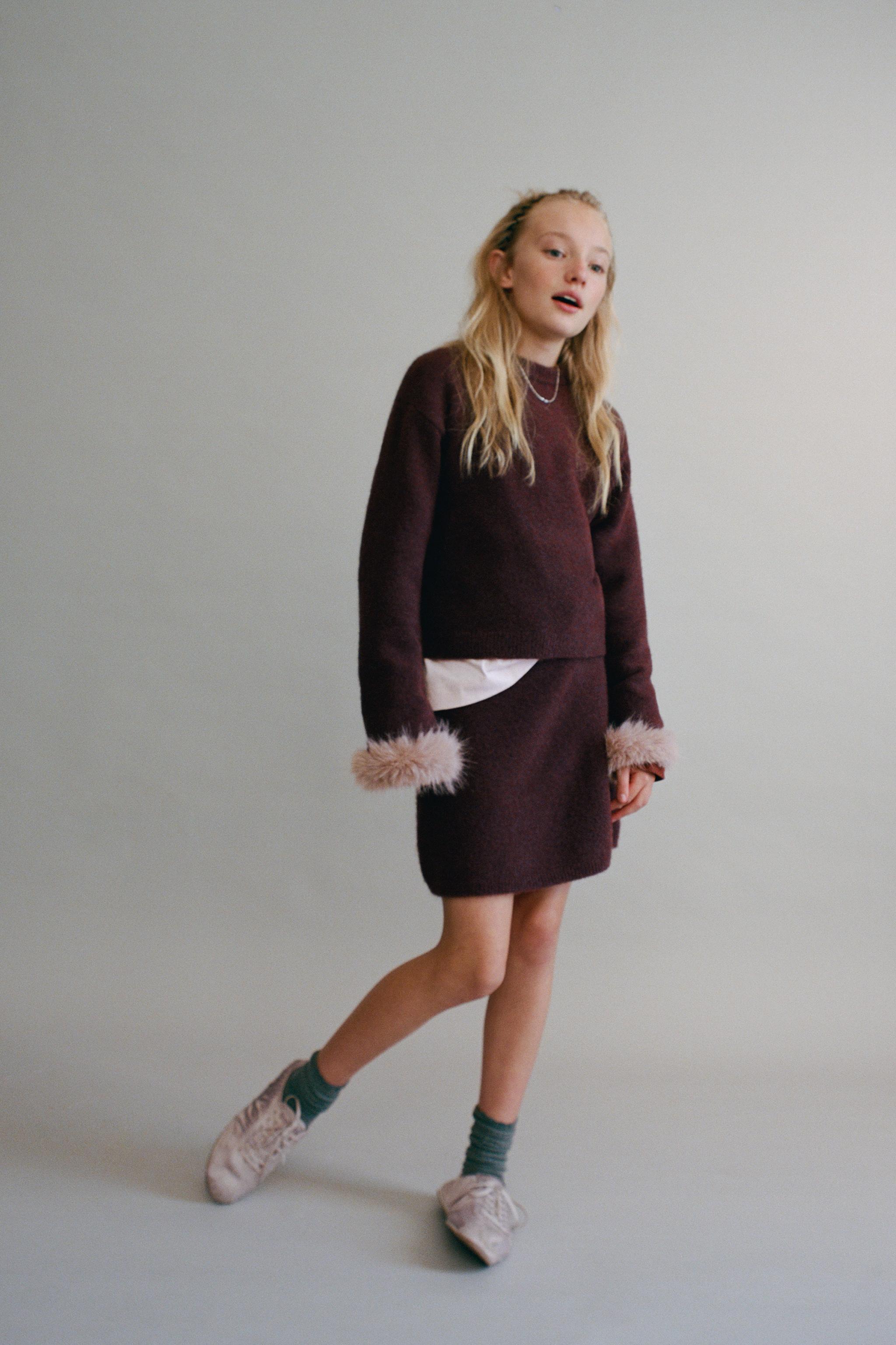 PULL EN MAILLE POIGNETS EFFET FOURRURE