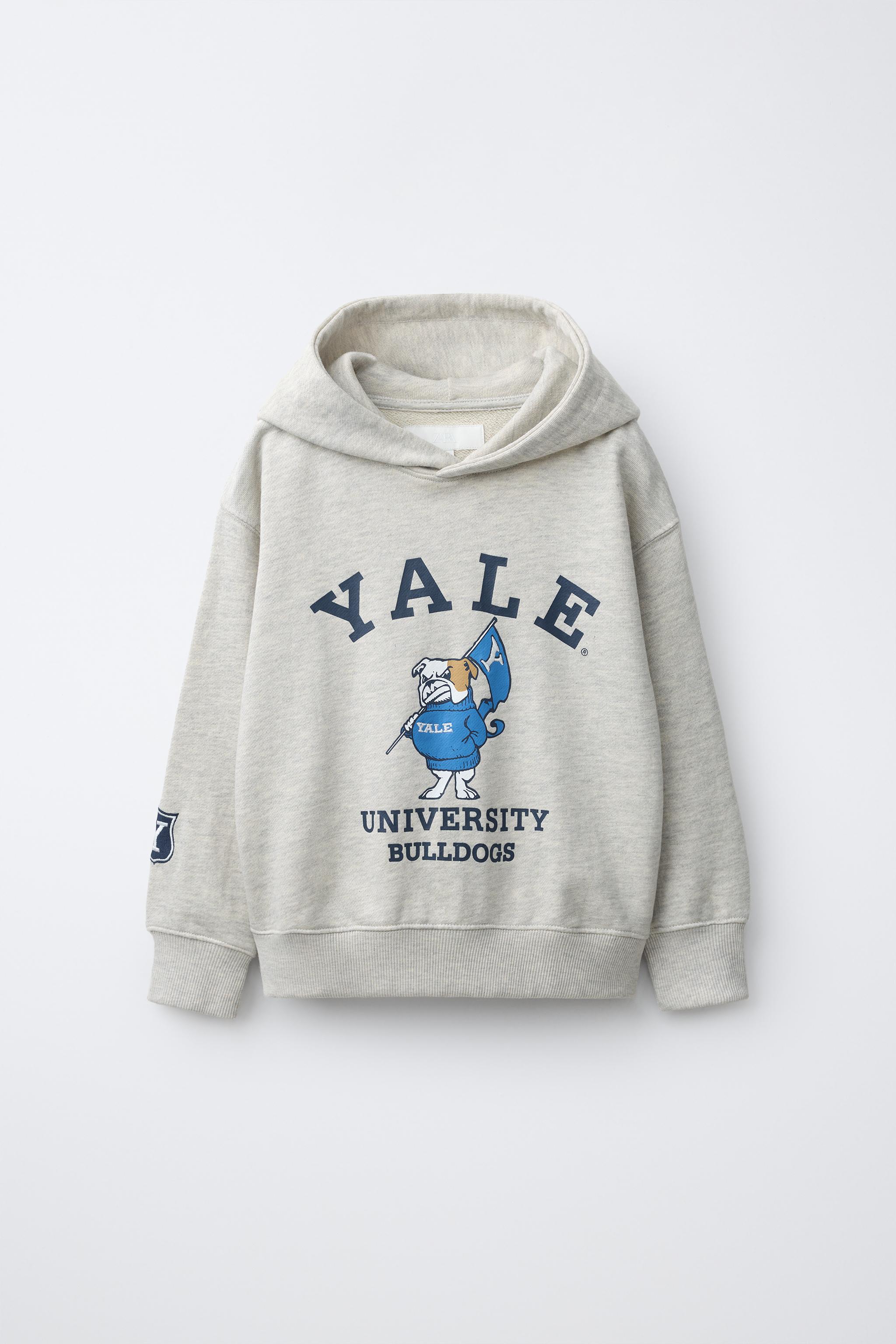 SWEAT À CAPUCHE IMPRIMÉ YALE™
