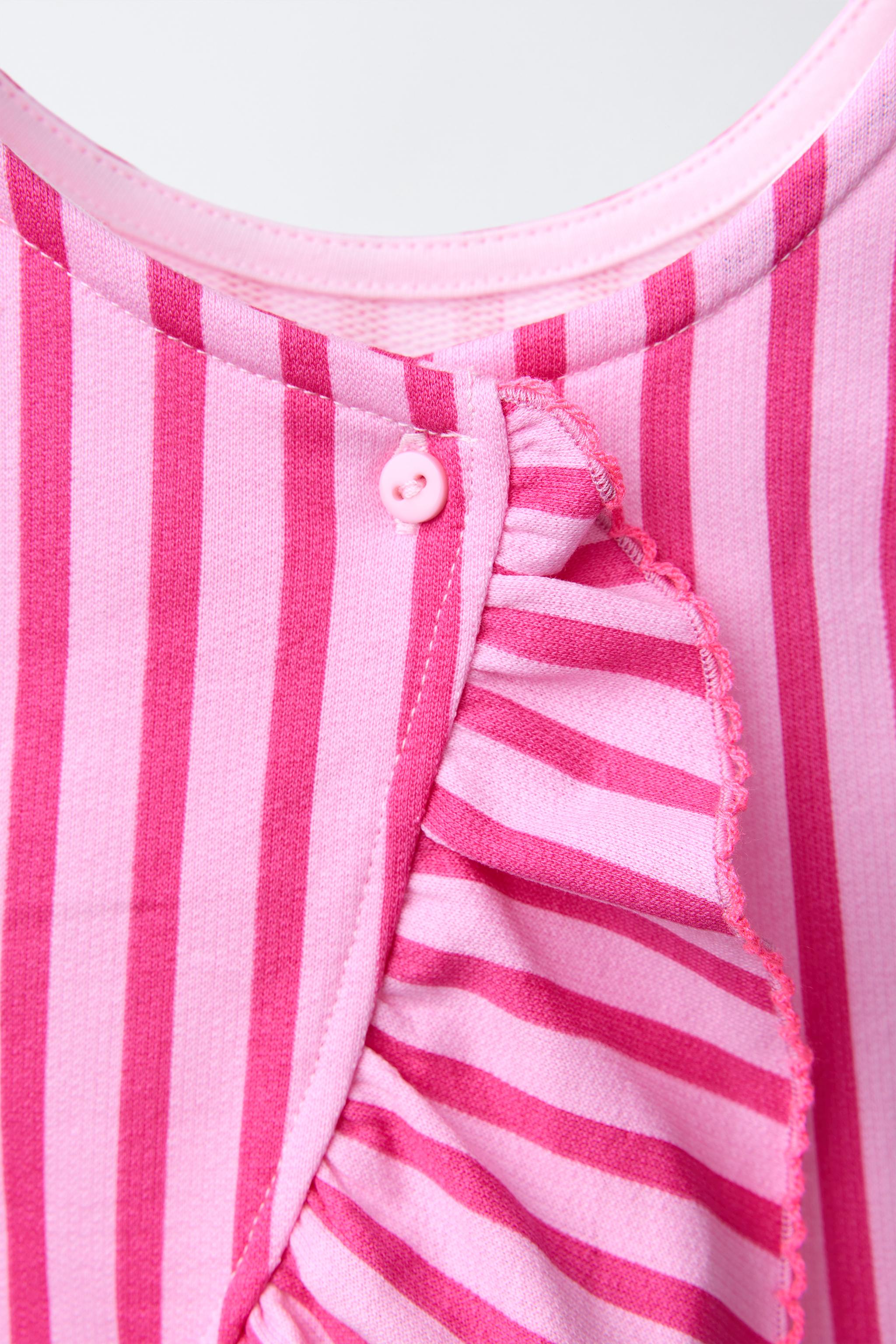 STRIPED PEPLUM TOP WITH CONTRAST LACE