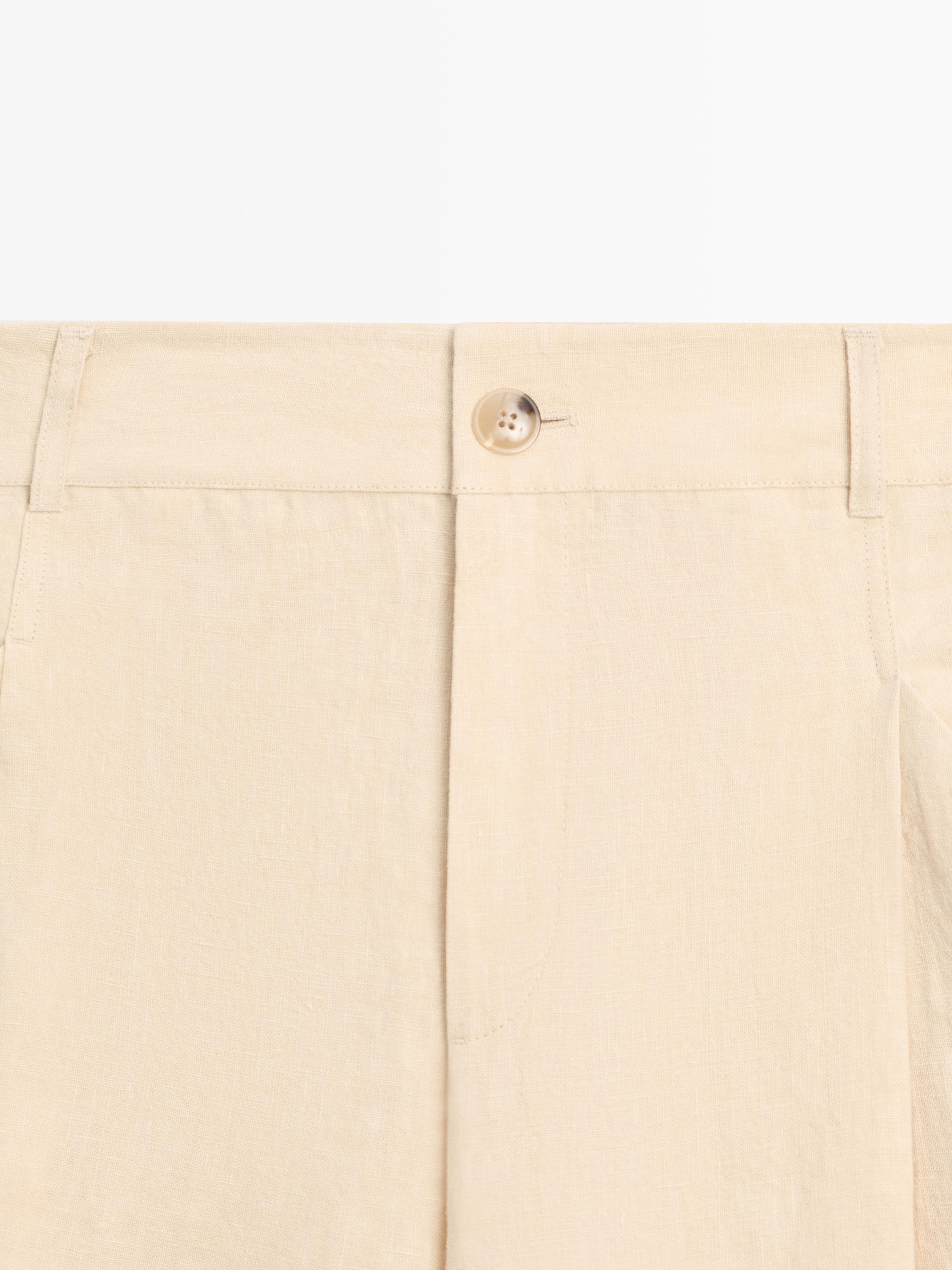 Wide-leg linen trousers with pocket detail